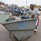 Scrap dealer Vernon Mills pledged he would not "miss out on a good deal" as he hauled away what's left of Detroit's East Side.